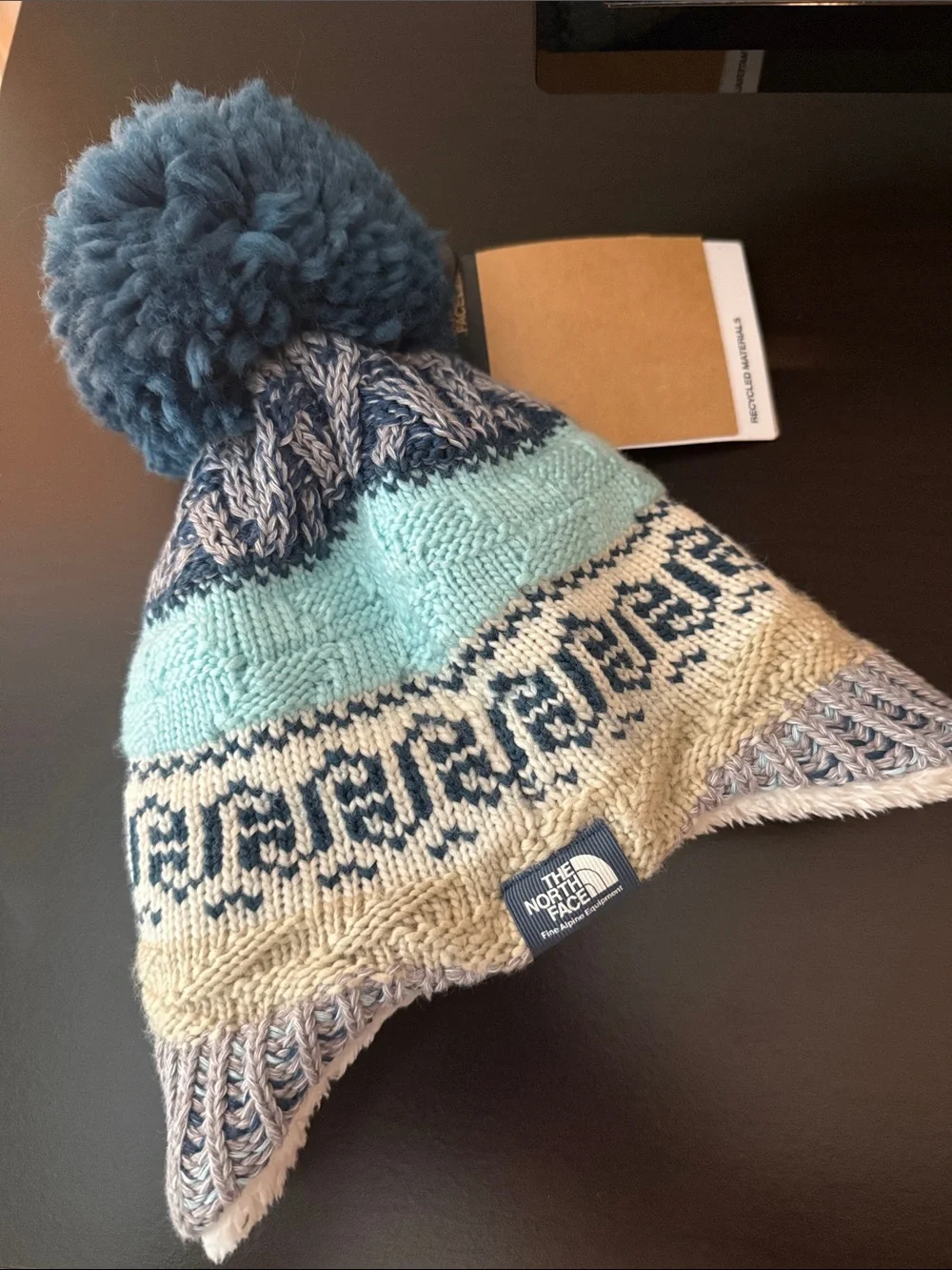 NWT The North Face covered ears beanie pom Pom 0-6 months